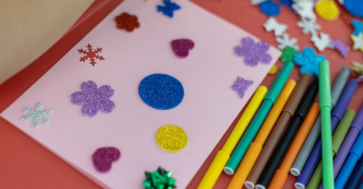 A vibrant handmade card decorated with glitter and stickers, perfect for creative projects.